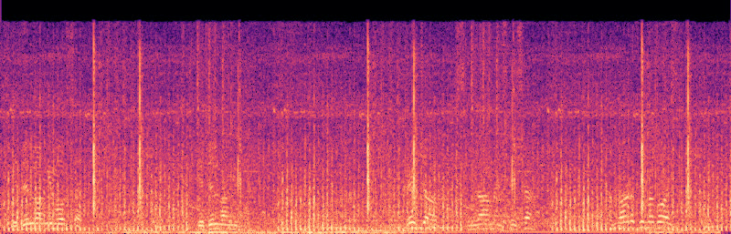 Spectrogram of the noisy input: broadband noise covers every frequency for the whole eight seconds, with bright vertical streaks from impulsive bangs.